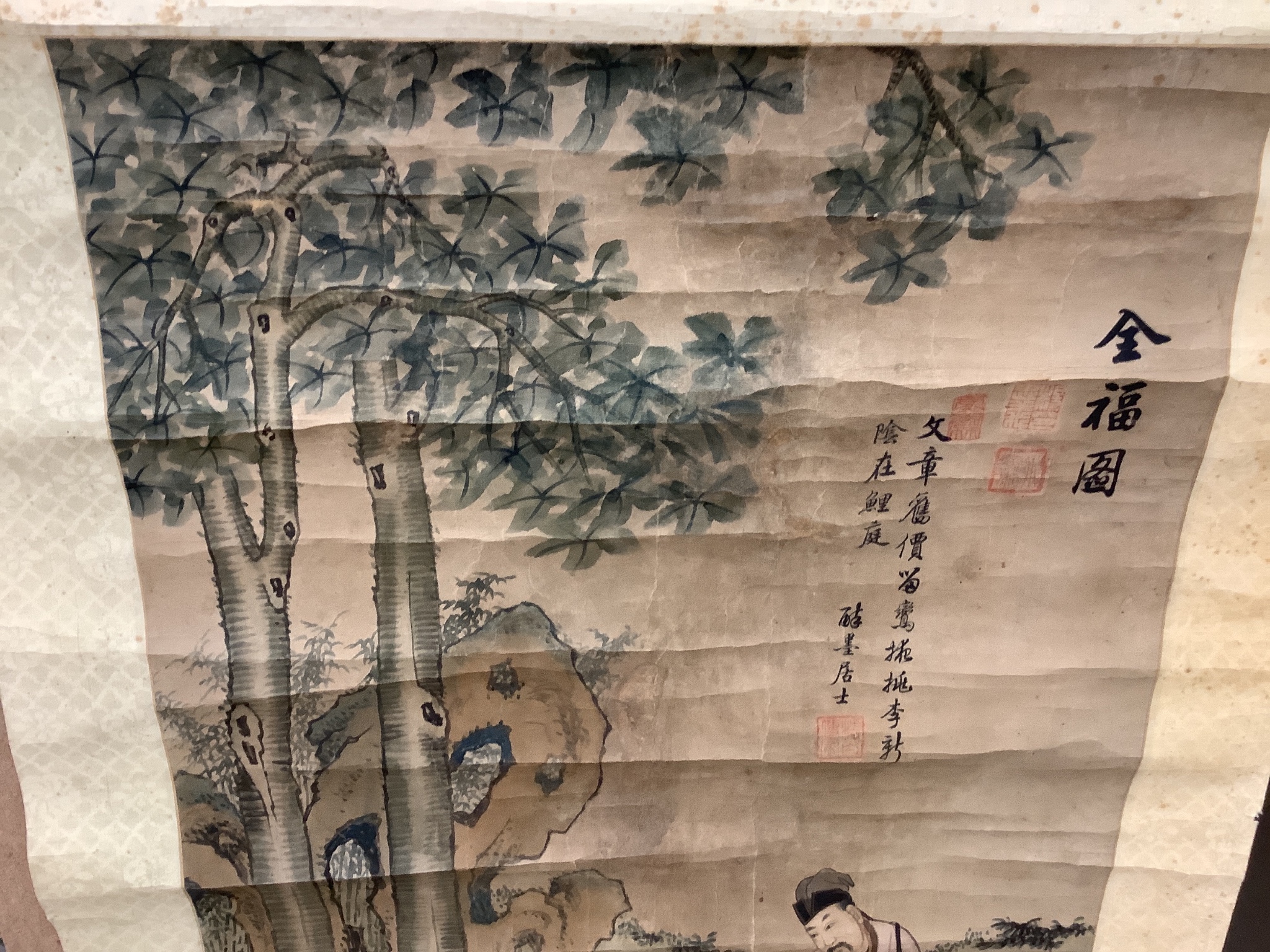 A 19th century Chinese ancestor painting, a 19th century Chinese scroll painting on paper of a sage and other figures, Image 100x 47 cm and a calligraphic scroll (3)